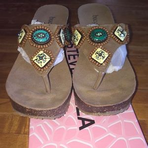 Bucco open toe wedge sandals